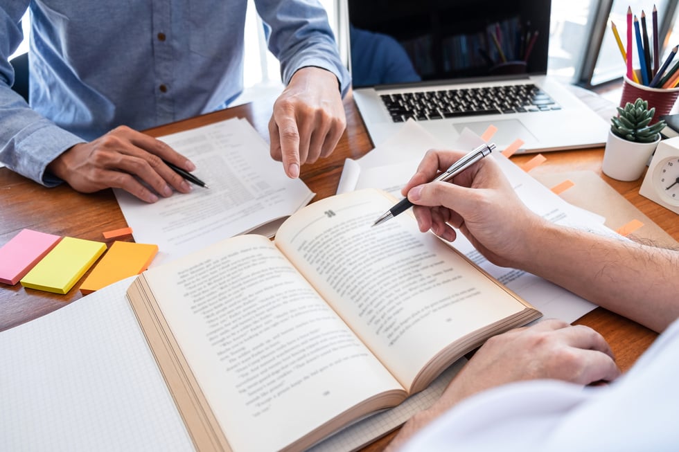 Man Private Tutoring a Student 